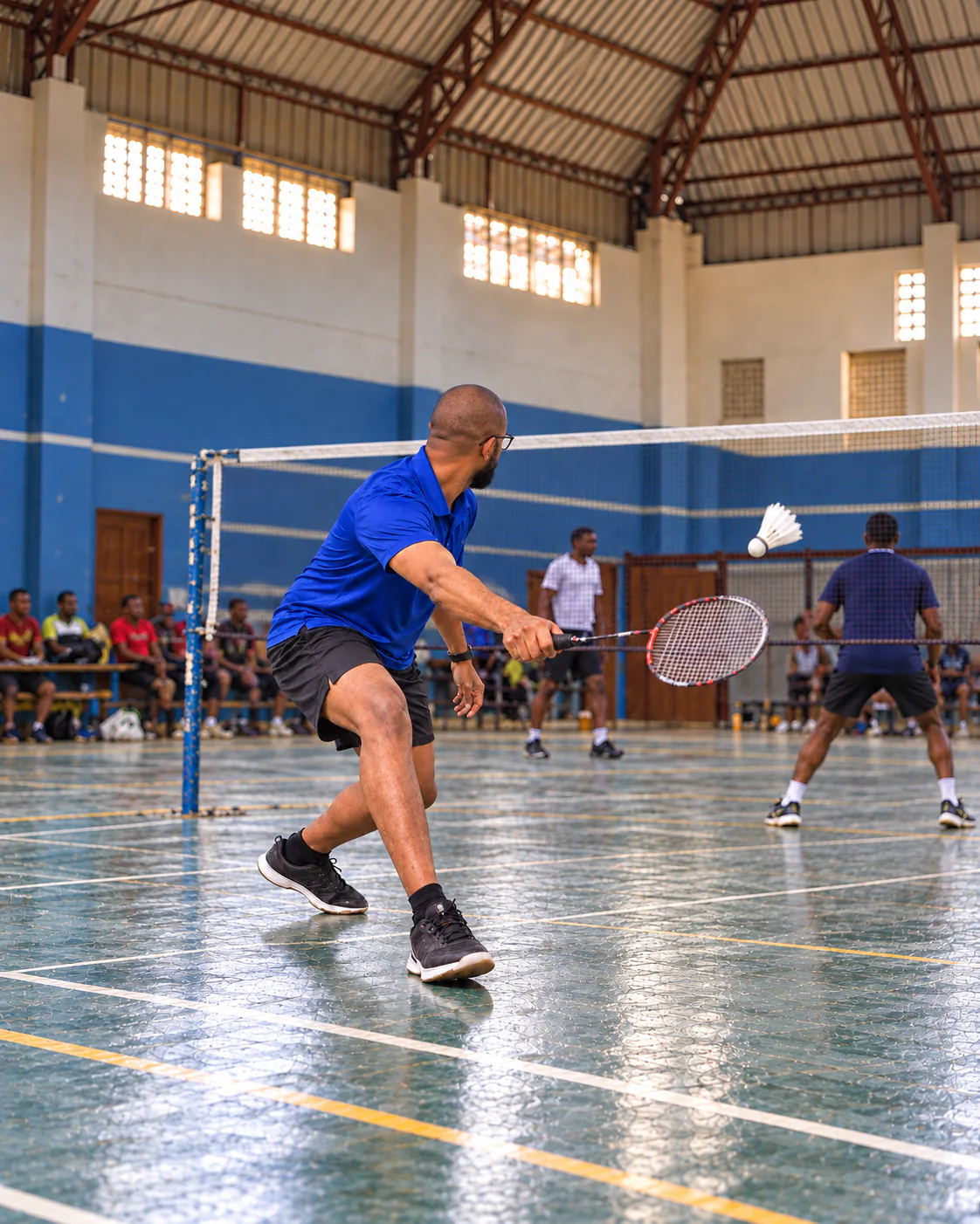 Eric playing badminton